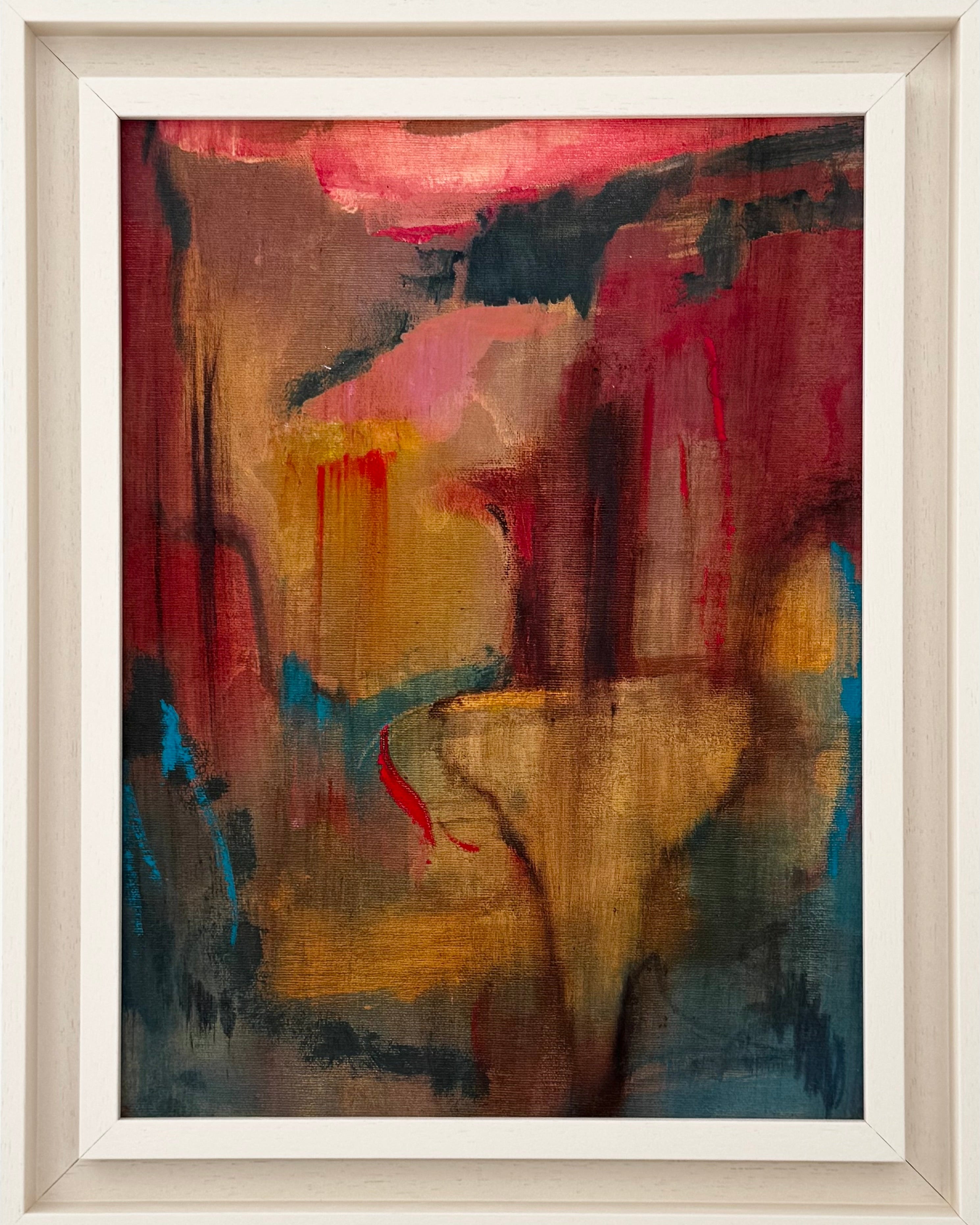 Abstract painting with bold colors in a white frame