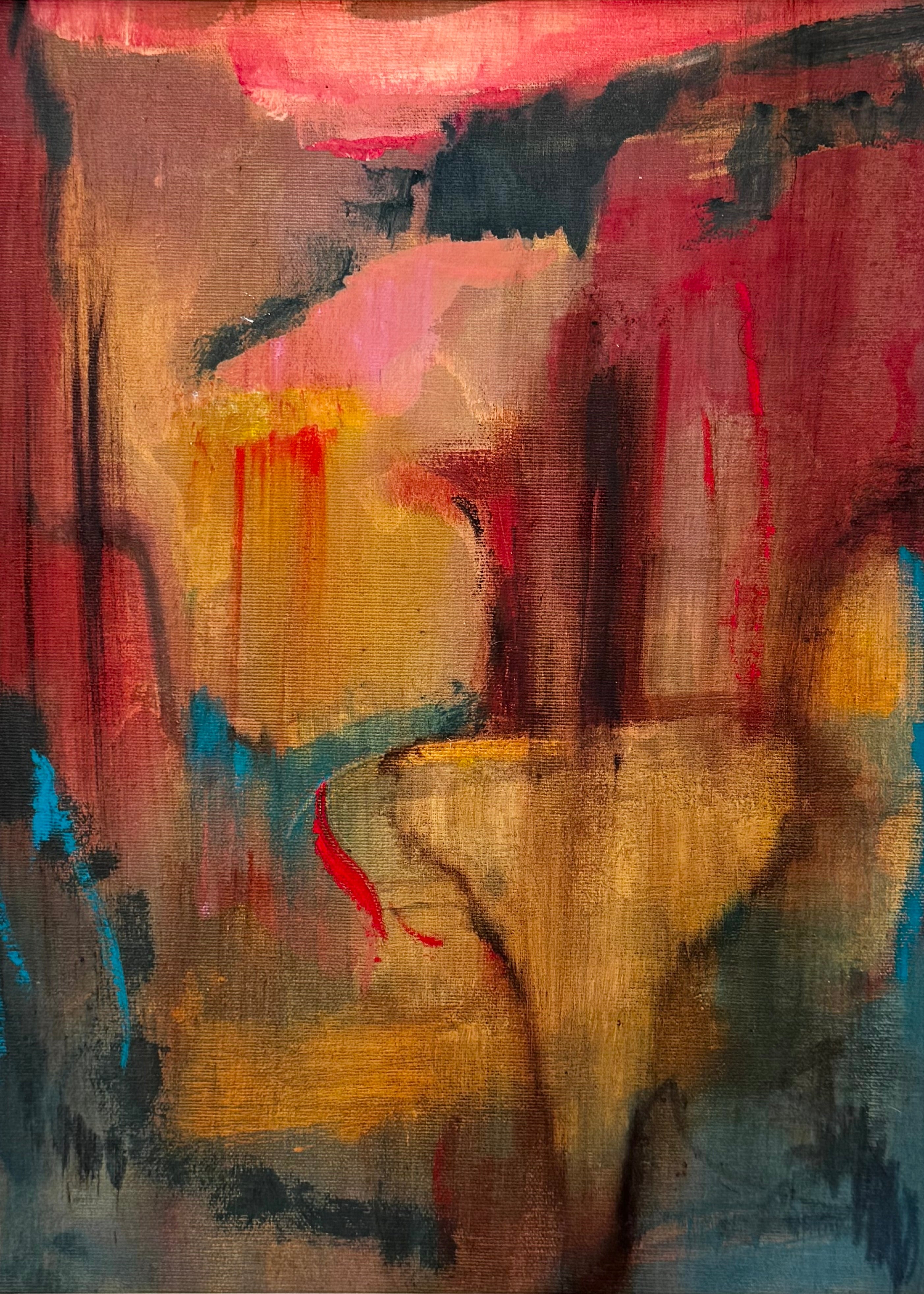 Abstract painting with a mix of red, yellow, and blue colors on a textured surface.